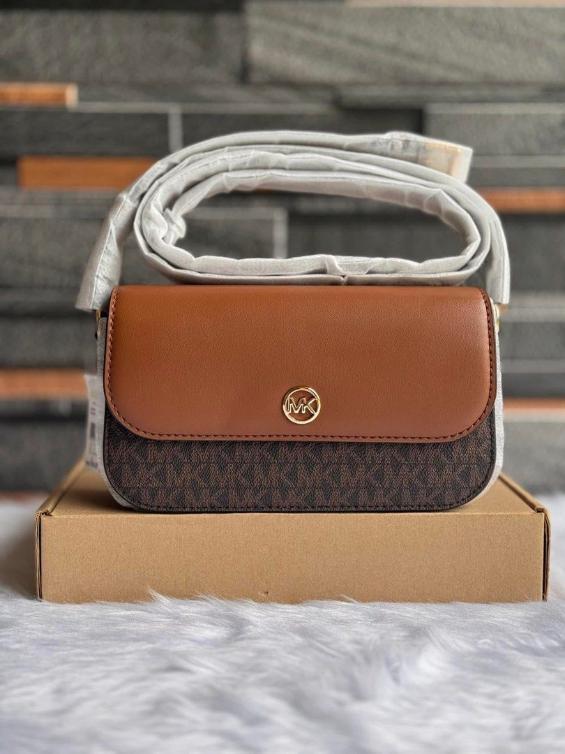 Michael Kors Jet Set Small Logo Crossbody Bag (Category: Luxury Bags & Wallets) located in Santa Rosa. Submitted by miqboutique (Listing ID 1348471473, Image 3). Description: MK Jet Set Travel Small Logo Crossbody Bag •Ready to ship •Inclusions: tag & carecard •Guaranteed Original Fb page: Miq's Boutique.