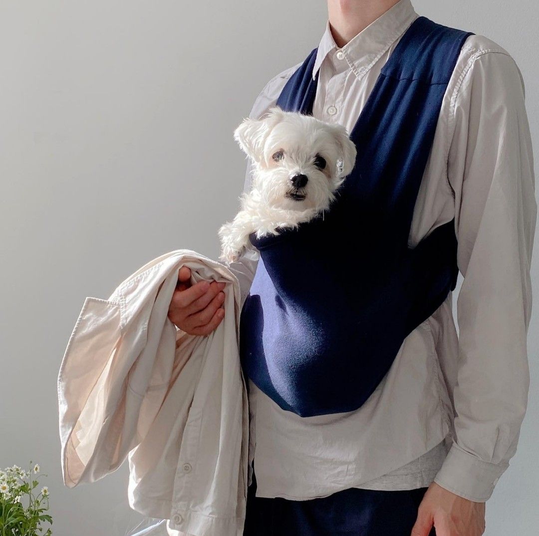 Pet Sling Bag (Category: Homes & Other Pet Accessories) located in Singapore. Submitted by tengilz (Listing ID 1348535941, Image 2). Description: Korean Pet Sling Bag. Pet will be in front, like a kangaroo pouch. Navy color..
