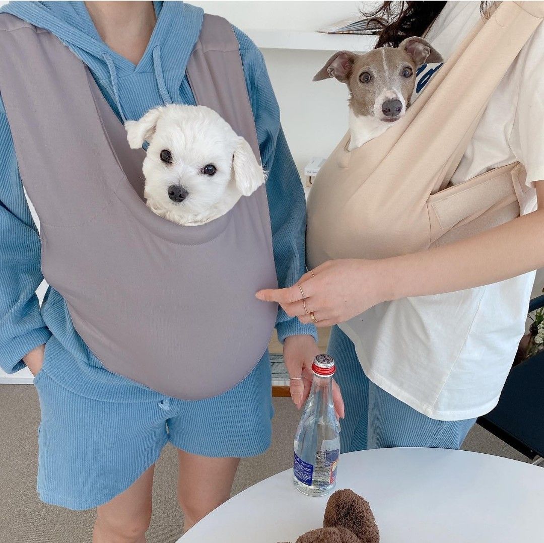 Pet Sling Bag (Category: Homes & Other Pet Accessories) located in Singapore. Submitted by tengilz (Listing ID 1348535941, Image 1). Description: Korean Pet Sling Bag. Pet will be in front, like a kangaroo pouch. Navy color..