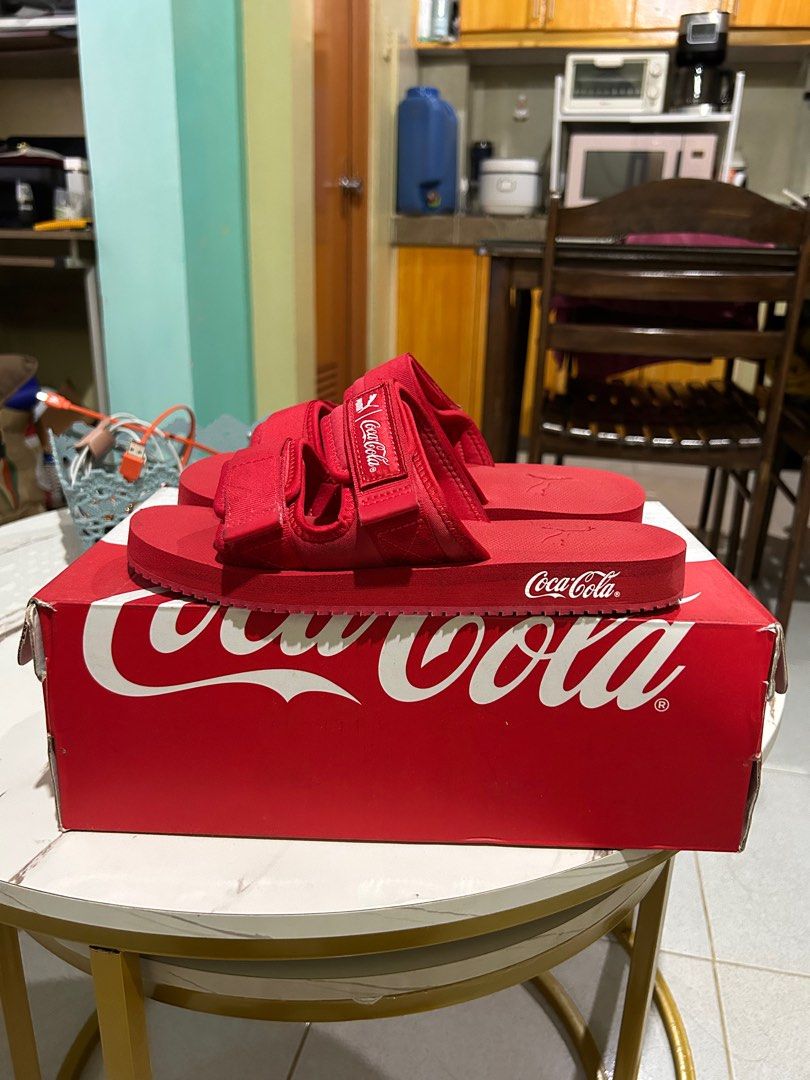 Puma slides X Coca Cola (Category: Slippers & Slides) located in Rizal. Submitted by declutter101s (Listing ID 1348436400, Image 1). Description: Original with box featuring collaboration Coca Cola X puma. 2x used money back if proven fake, bought in Qatar 🇶🇦 negotiable serious buyer thanks..