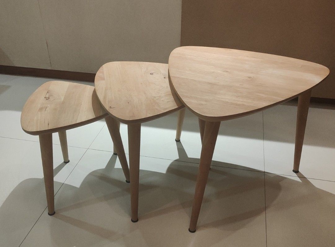 Stackable tables (Category: Tables & Sets) located in Singapore. Submitted by sofarsogood3388 (Listing ID 1348618437, Image 3). Description: A set of 3 stackable triangular tables . As shown in photos all in absolutely great condition. No dents , no stains, no scratches..