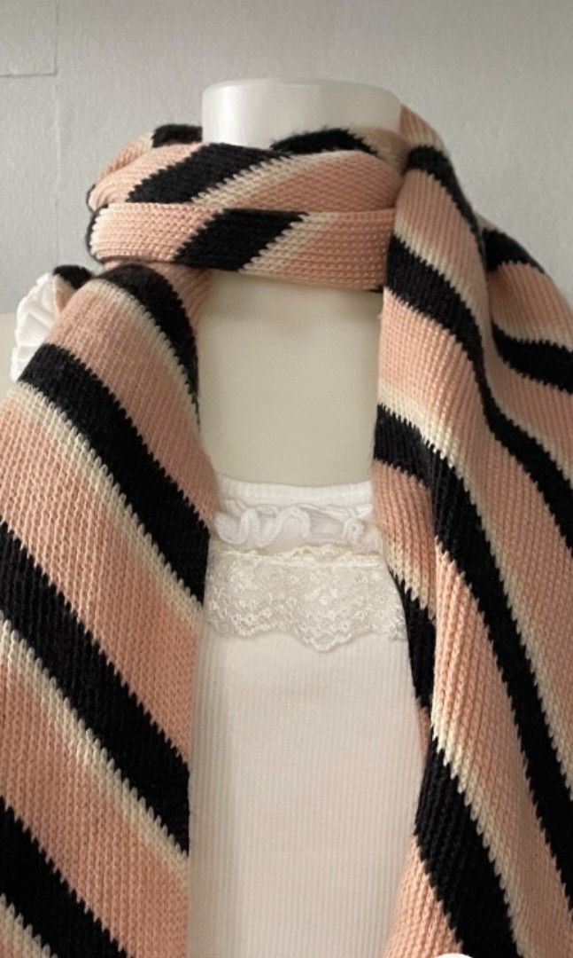 Tri-color Knit Scarf (Category: Scarves) located in Pasay City. Submitted by ceylon770 (Listing ID 1348569576, Image 1). Description: Bought from Japan Perfect for autumn/winter fashion Comes with freebie plain cream scarf MOP: Gcash, BDO, GoTyme.