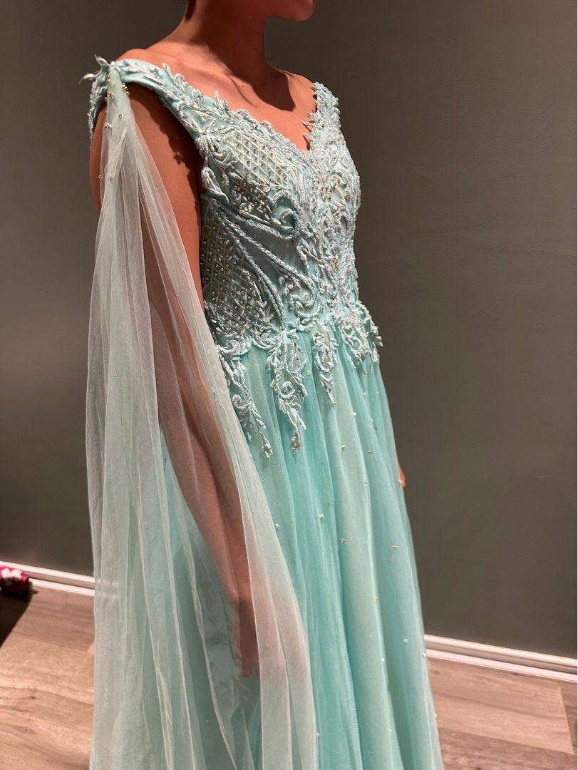Turquoise tulle beaded gown (Prom) (Category: Evening dresses & gowns) located in Jimenez. Submitted by cflamd (Listing ID 1348547715, Image 3). Description: RFS: decluttering Worn once by sister during prom Fits XXS to XS size Padded Reference photos tight on me (can't close back, but can be altered) Last photo is when worn by sister (right size) Free shipping.