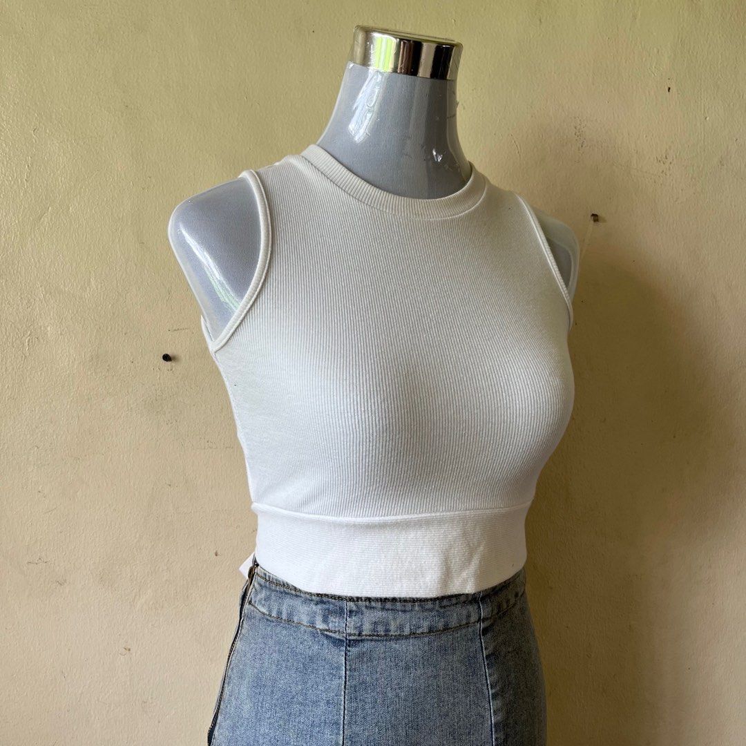 White Tank Top (Category: Sleeveless) located in Quezon City. Submitted by midnight.muse (Listing ID 1348582295, Image 2). Description: .