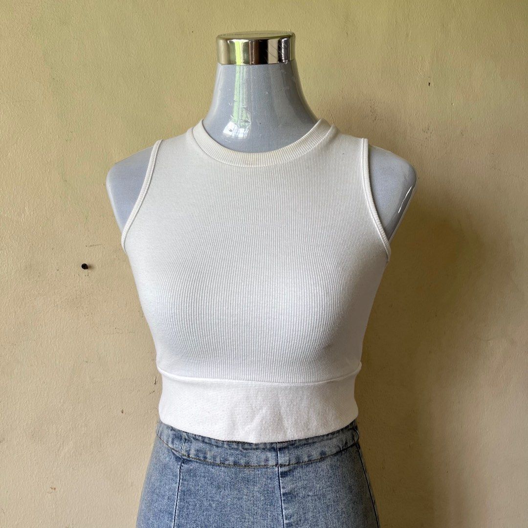 White Tank Top (Category: Sleeveless) located in Quezon City. Submitted by midnight.muse (Listing ID 1348582295, Image 1). Description: .