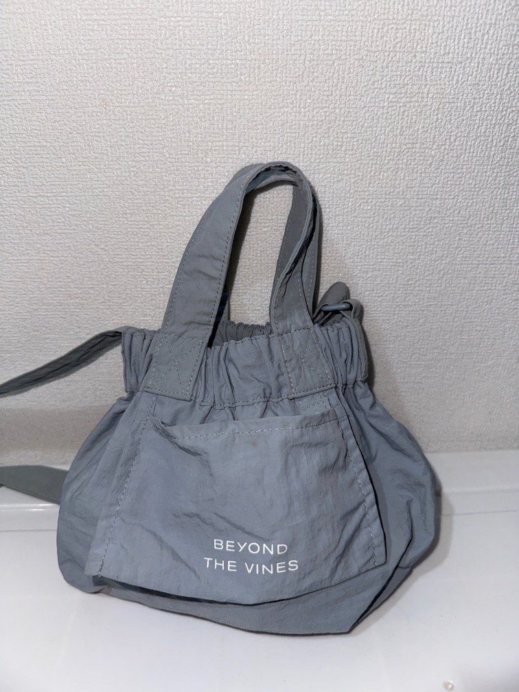 Beyond the Vines XS dumpling bag (Category: Cross-body Bags) located in Davao. Submitted by kateshops (Listing ID 1348811489, Image 1). Description: Old design, no magnetic closure yet Used only a few times Rfs: decluttering.