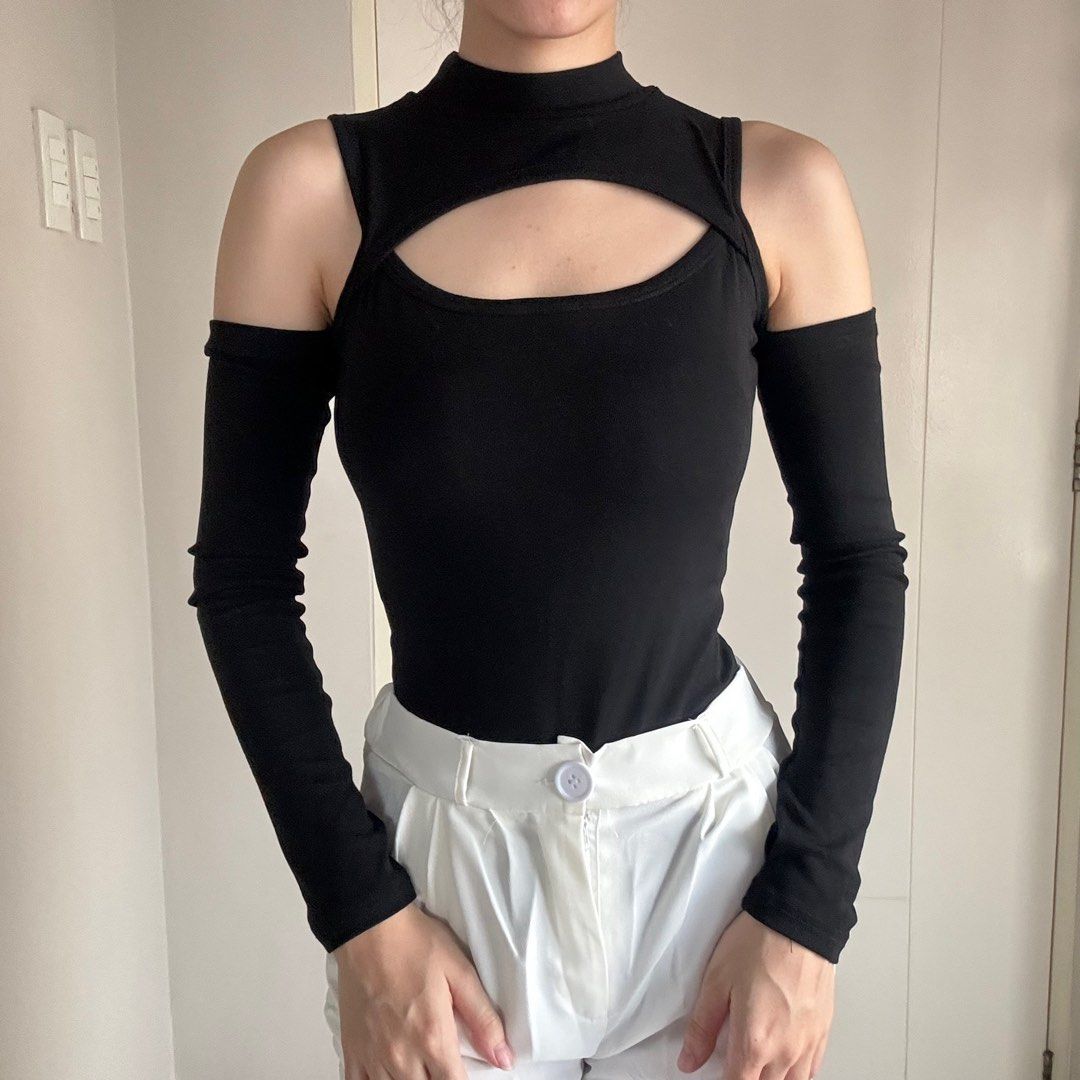 Black cutout top (Category: Longsleeves) located in Quezon City. Submitted by luvluva (Listing ID 1348737828, Image 1). Description: worn once .