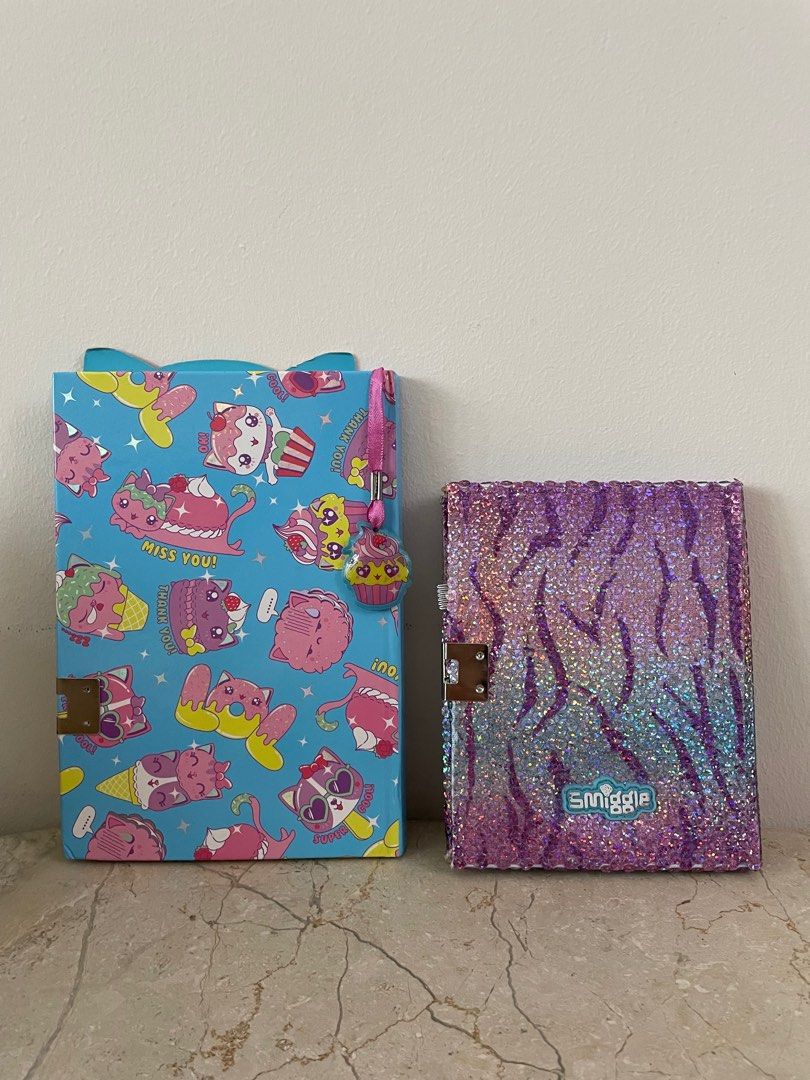 Cheap Smiggle Notebooks (Category: Children's Books) located in Singapore. Submitted by jiasales (Listing ID 1348675480, Image 2). Description: both have 1 or 2 pages written in. otherwise, good as new! what you see is what u get :) one for $3 cat notebook has a lock + key! other does not. meetups at cck mrt.