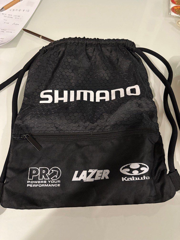 Draw string bag (Category: Backpacks) located in Singapore. Submitted by ericaobl (Listing ID 1348778649, Image 1). Description: Shimano draw strong bag .