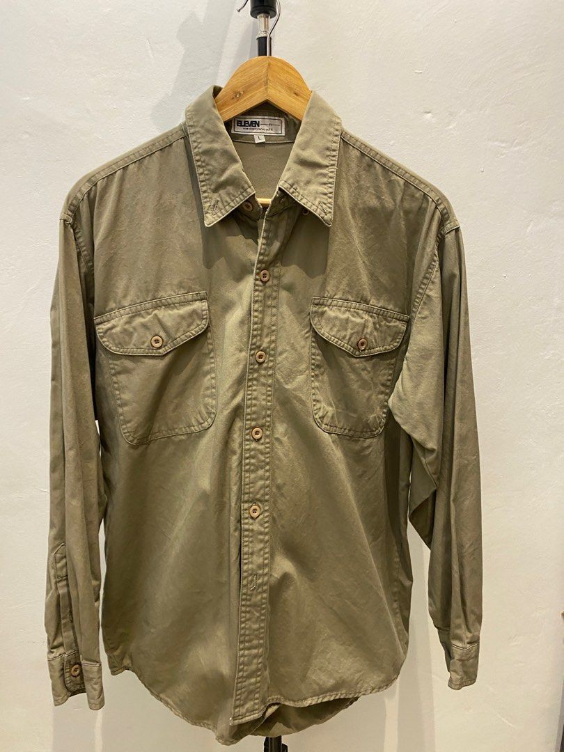 ELEVEN Brown Detailed Longsleeves (Category: Formal Shirts) located in Caloocan City. Submitted by fddpy (Listing ID 1348778133, Image 1). Description: Selling my Brown Longsleeves for 350 only with no any issues. Large in size but can fit in medium. • 22inch sleeves • 25inch length • 21inch width.