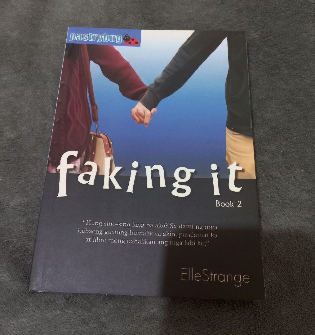 Faking it by Elle Strange (Book 1 and 2) (Category: Storybooks) located in Gapan. Submitted by isabeltries (Listing ID 1348728219, Image 2). Description: Faking it by ElleStrange 2 books for only ₱150 Condition: 9/10 Can send more photos of the book..