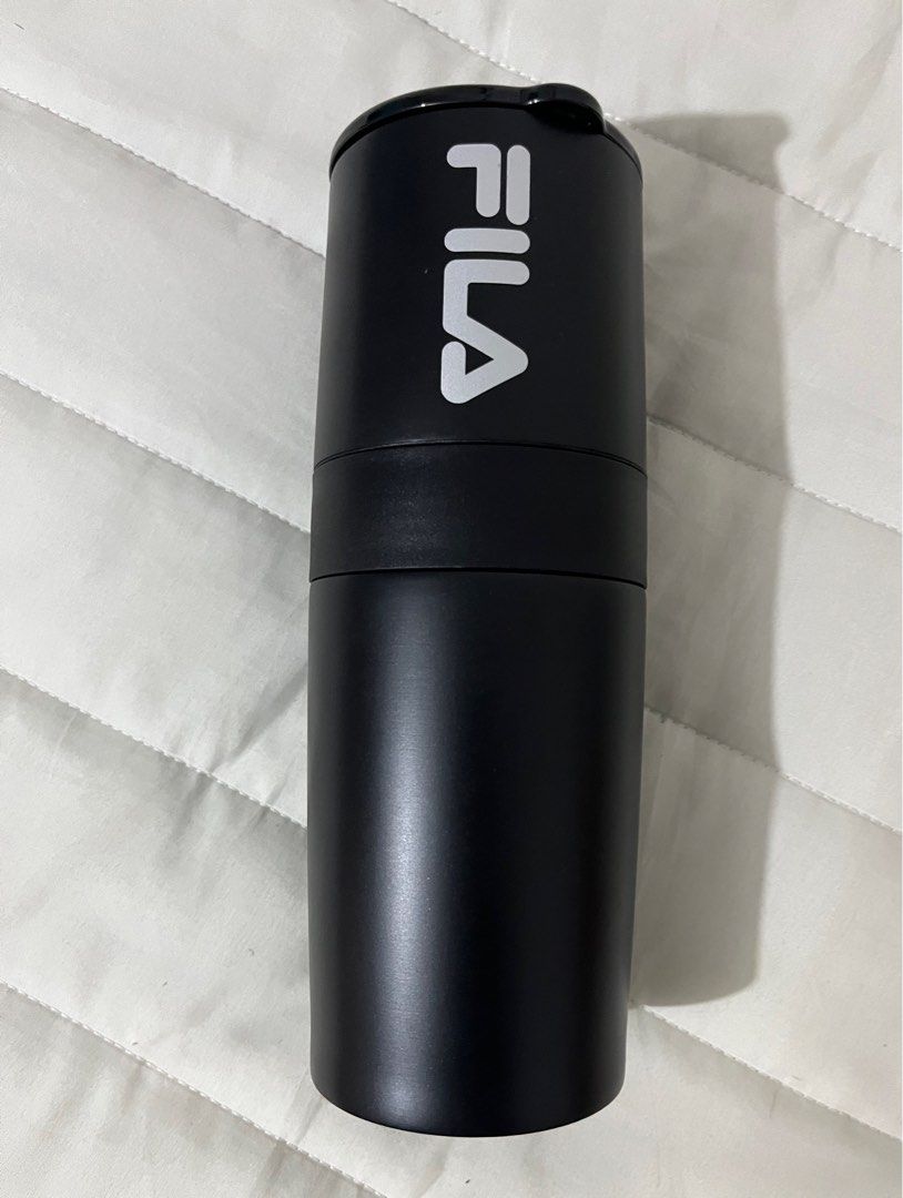 Fila tumbler with coffee grinder (Category: Water Bottles & Tumblers) located in Manila. Submitted by hellothere2012 (Listing ID 1348738259, Image 1). Description: New without box.