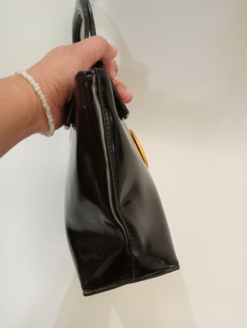 Gianni versace (Category: Luxury Bags & Wallets) located in Batangas. Submitted by venus232nd (Listing ID 1348816964, Image 3). Description: good condition.