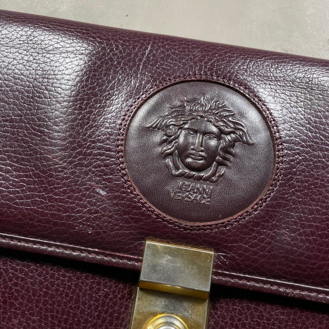 GIANNI VERSACE MEDUSA HEAD MAROON ENVELOPE EVENING FLAP (Category: Luxury Bags & Wallets) located in Manila. Submitted by revise.ph_ (Listing ID 1348628930, Image 2). Description: GIANNI VERSACE MEDUSA HEAD MAROON ENVELOPE EVENING FLAP CLUTCH BAG Made in Dimension Length/Height:11 Width:15 Side Width:2.5 issue:CHECK DETAILED PHOTOS Price:4,000 Free shipping via JNT.