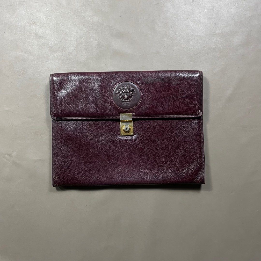 GIANNI VERSACE MEDUSA HEAD MAROON ENVELOPE EVENING FLAP (Category: Luxury Bags & Wallets) located in Manila. Submitted by revise.ph_ (Listing ID 1348628930, Image 1). Description: GIANNI VERSACE MEDUSA HEAD MAROON ENVELOPE EVENING FLAP CLUTCH BAG Made in Dimension Length/Height:11 Width:15 Side Width:2.5 issue:CHECK DETAILED PHOTOS Price:4,000 Free shipping via JNT.