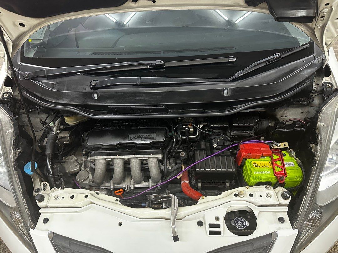 Honda Jazz 1.3 L (A) (Category: Used Cars) located in Singapore. Submitted by postcerealstockist (Listing ID 1348672789, Image 2). Description: Stock Condition 16KM/L Advance Exhaust With Cert Bridgestone RE005 (YYY1426) Mohawk Android Player (4+64GB) Mohawk Speaker X4 Mohawk Twitter X300 Front & Rear Camera Tinted Lowered Neon Light Sheltered Parking Baby Friendly Family Car No Consignment No Free Ads Direct Owner Full Tank 600KM (RPM 2 @ 90km/h