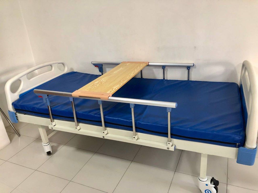 Hospital Bed with IV Pole (Category: Everything Else Others) located in Quezon City. Submitted by gem620 (Listing ID 1348696265, Image 2). Description: ✅ Mint condition - used for 2 weeks only ✅ 2 manual cranks ✅ Back lifting function ✅ Leg lifting function ✅Leatheret Foam ✅ With headboard and footboard ✅ With guard rails ✅ With movable dining table ✅ With IV pole ✅ Safety lock SLIGHTLY NEGOTIABLE For pick-up or delivery Location: Brgy. Culiat, T