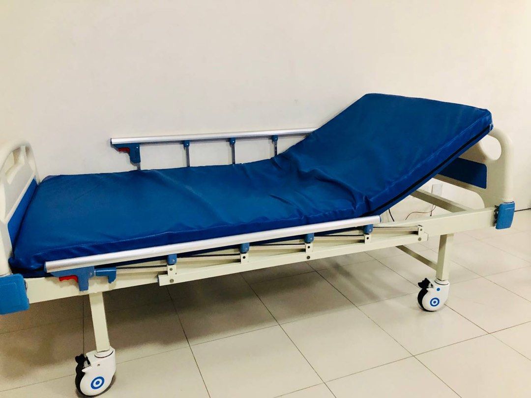 Hospital Bed with IV Pole (Category: Everything Else Others) located in Quezon City. Submitted by gem620 (Listing ID 1348696265, Image 3). Description: ✅ Mint condition - used for 2 weeks only ✅ 2 manual cranks ✅ Back lifting function ✅ Leg lifting function ✅Leatheret Foam ✅ With headboard and footboard ✅ With guard rails ✅ With movable dining table ✅ With IV pole ✅ Safety lock SLIGHTLY NEGOTIABLE For pick-up or delivery Location: Brgy. Culiat, T