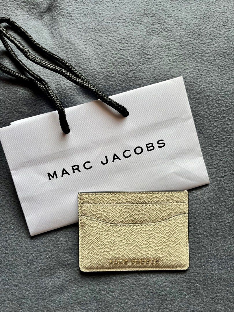Marc Jacobs card holder (Category: Luxury Bags & Wallets) located in Makati City. Submitted by prelovedbydenn (Listing ID 1348662598, Image 1). Description: Authentic Marc Jacobs card holder Bought from outlet With receipt.