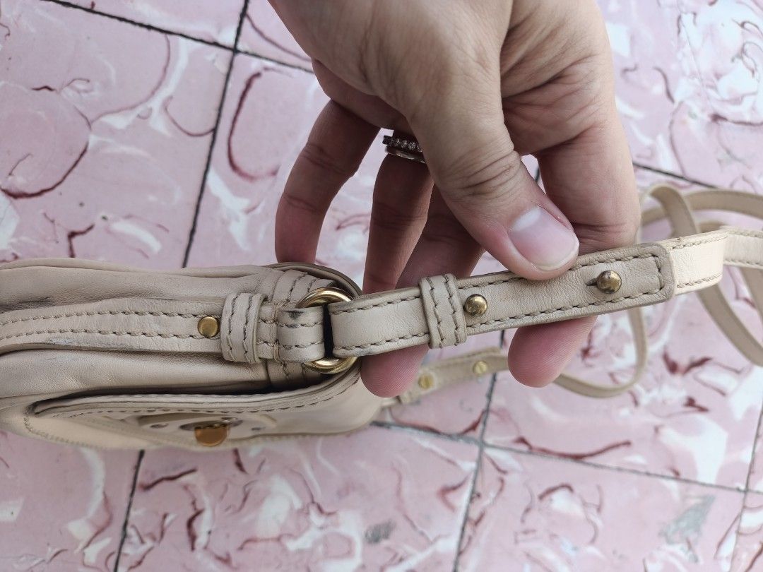 Mini CrossBody Bag Marc by Marc Jacobs (Category: Luxury Bags & Wallets) located in Bulacan. Submitted by thriftstationplus (Listing ID 1348708677, Image 3). Description: Everything you need to know about the bag! 🏆Condition of: ☀️Leather: 7.9/10 - Baige leather is smooth inside and has minimal flaws outside. - The color is still nice and good. - Leather is a bit dry but still good. ☀️Hardwares: 7.5/10 - Shiny but some of it are starting to tarn