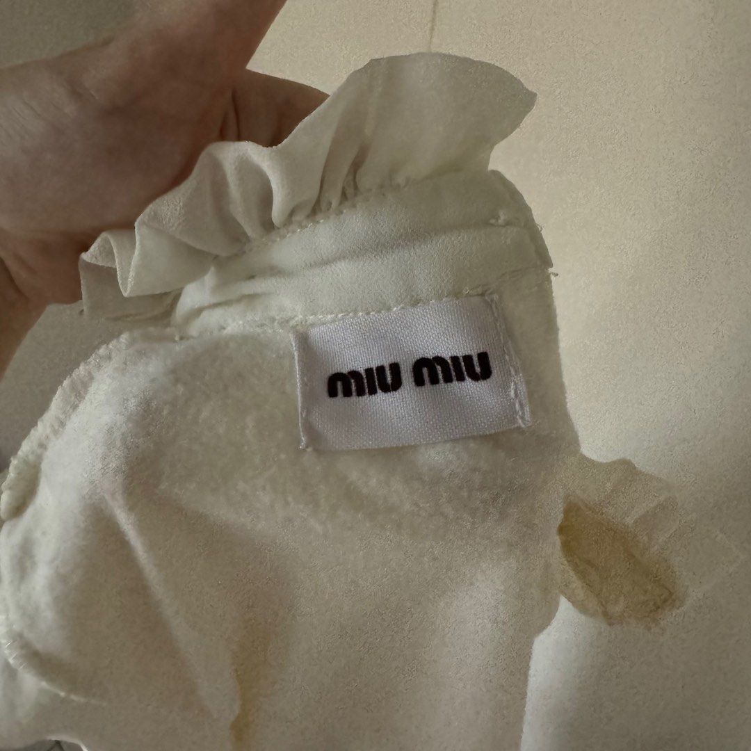 Miu Miu longsleeve lace top (Category: Longsleeves) located in Quezon City. Submitted by luvluva (Listing ID 1348737116, Image 3). Description: barely used, no issues authentic, bought it from another carousell seller .