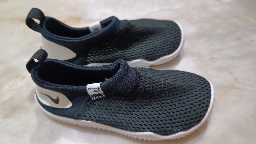 Nike beach shoes (Category: Babies & Kids Fashion) located in Manila. Submitted by unboxing_addict (Listing ID 1348654320, Image 2). Description: nike beach swim shoes to protect your baby from the sand corals and rocks on the beach US 7c size.