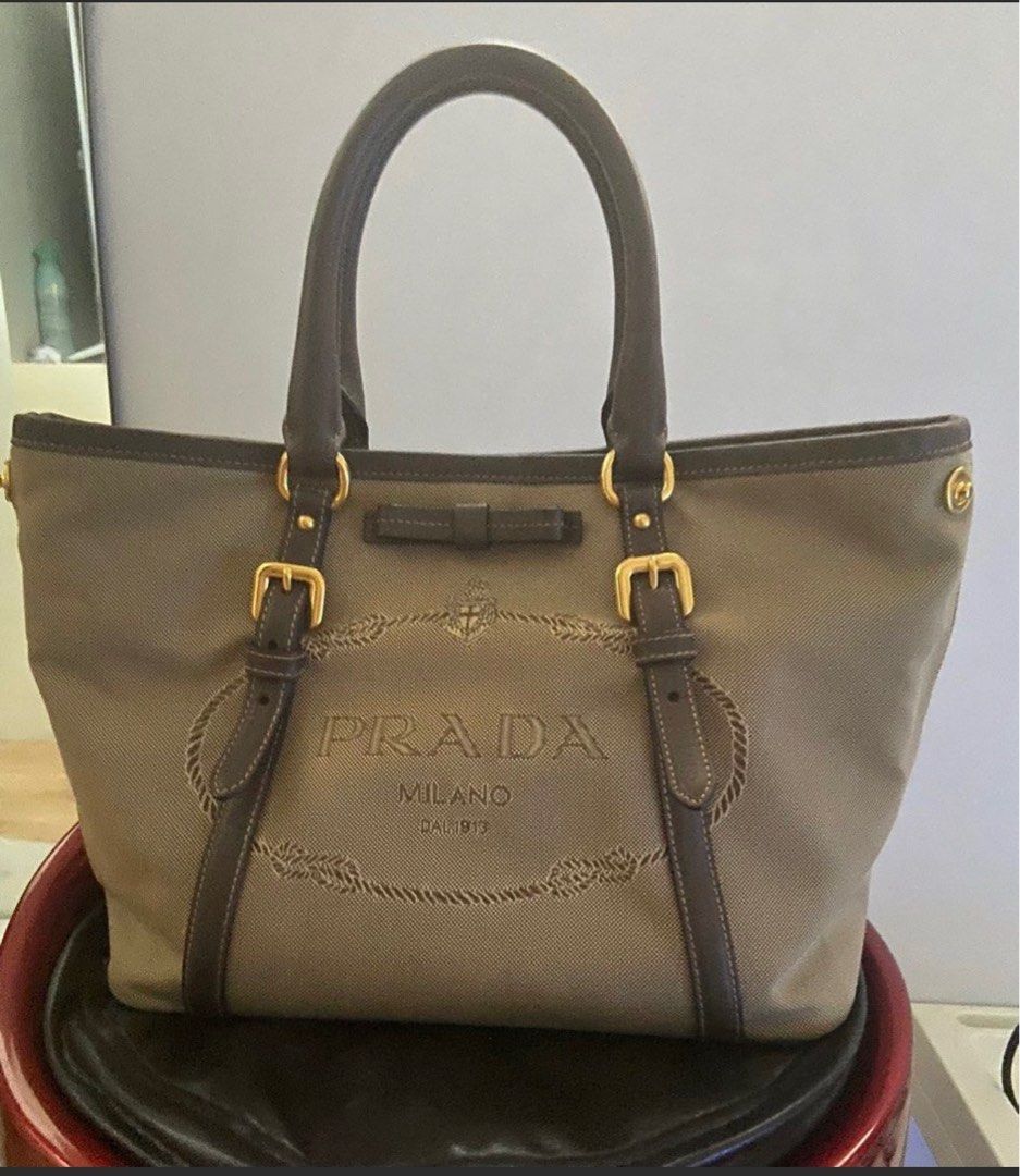 Prada Tessuto Nylon (Category: Luxury Bags & Wallets) located in Quezon City. Submitted by mypersonalstuff_10 (Listing ID 1348642615, Image 1). Description: 💯 % Authentic Prada logo Jacquard. Two way bag. Can be worn cross body or as hand bag. Complete inclusions. With dust bag. Refer to last photo for issue which is hardly noticeable since it’s inside the bag. Rank A condition. K.