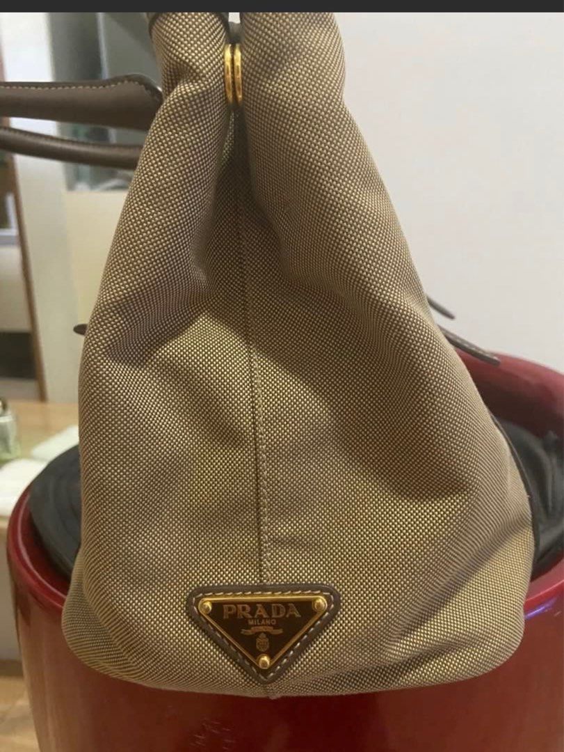 Prada Tessuto Nylon (Category: Luxury Bags & Wallets) located in Quezon City. Submitted by mypersonalstuff_10 (Listing ID 1348642615, Image 3). Description: 💯 % Authentic Prada logo Jacquard. Two way bag. Can be worn cross body or as hand bag. Complete inclusions. With dust bag. Refer to last photo for issue which is hardly noticeable since it’s inside the bag. Rank A condition. K.