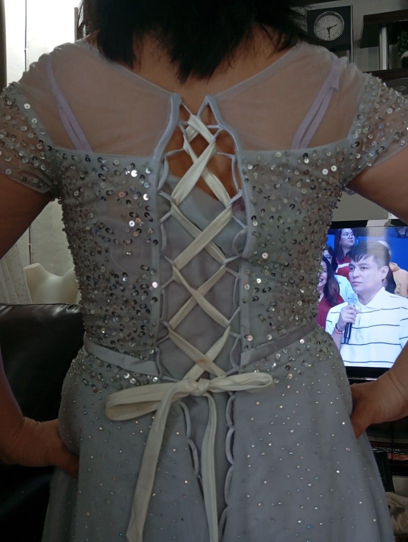 Pre loved Silver sequined long dress/gown (Category: Evening dresses & gowns) located in Quezon City. Submitted by esperanza_51 (Listing ID 1348795856, Image 3). Description: Silver long dress/gown. adjustable back. fits fr. small to large. up to 31 waist.