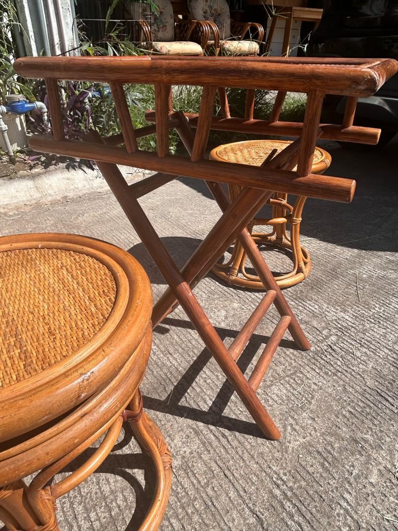 Rattan Foldable Table Set with 2 Stools (Category: Tables & Sets) located in General Trias. Submitted by tenshijapan (Listing ID 1348676453, Image 3). Description: Add a touch of rustic charm to your space with this beautiful rattan table set, perfect for both indoor and outdoor use. The set includes a unique foldable rattan table and two matching stools, designed with a timeless and stylish aesthetic. Whether you're hosting guests or enjoying a 