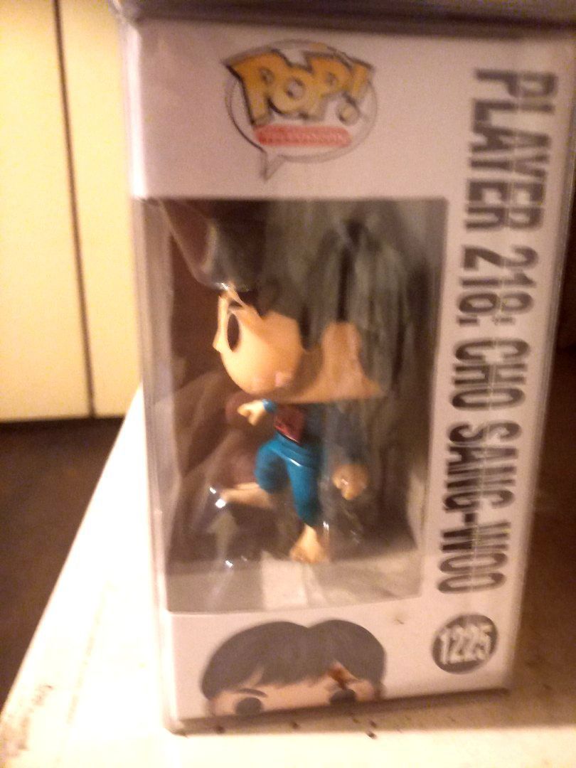 Squid Game Cho Sang Woo (Category: Designer & Blind Box Toys) located in Malabon City. Submitted by ninoaugust10 (Listing ID 1348777311, Image 2). Description: Cho Sang Woo Funko #1225 NOOB With protector Shipping or meetup.