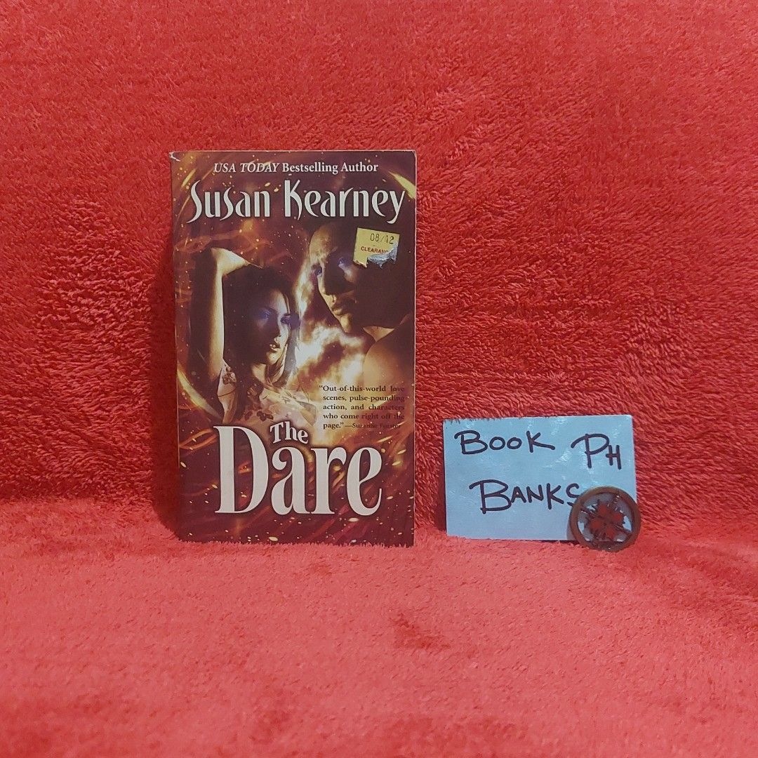 The Dare by Susan Kearney (MM) (Category: Storybooks) located in Bacoor. Submitted by bookbanksph (Listing ID 1348629989, Image 1). Description: ♤ Actual photos. Feel free to request additional photos. ♤ CONDITION: Has mild tanning and foxing. ♤ SYNOPSIS: DORA WANTS TO MAKE LOVE Specifically, Dora wants to make love with the handsome Rystani warrior-pilot Zical. But since Dora is a computer-albeit a sentient computer-she cannot experience touch, 
