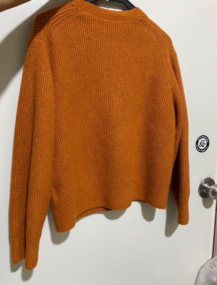 Uniqlo Cardigan (rust/orange) (Category: Longsleeves) located in Manila. Submitted by mailed (Listing ID 1348698209, Image 2). Description: Very comfortable! Size: 150 kids (can fit XS-S) .