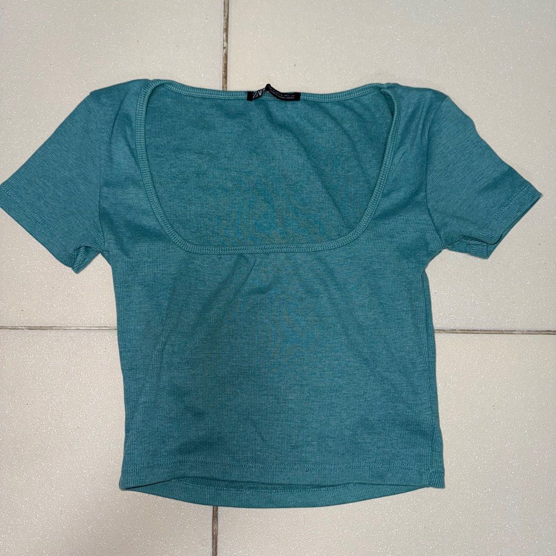 Zara Fitted Square Chest Teal Shirt SMALL (Category: Shirts) located in Manila. Submitted by eancc (Listing ID 1348682091, Image 1). Description: Fits XS to small frames, no damages RFS: Decluttering MOP: Gcash BDO BPI .