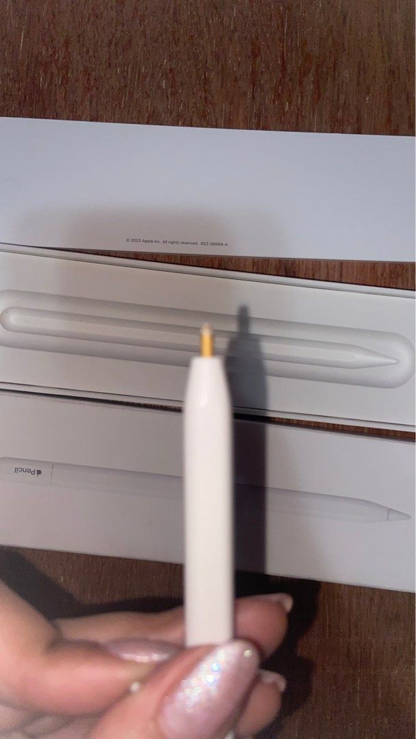 Apple Pencil USB-C (Category: Other Mobile & Gadget Accessories) located in Manila. Submitted by jadefinds (Listing ID 1348904300, Image 2). Description: The pencil still works and can still be connected via bluetooth. Only flaw is the tip, the gold part needs to be fixed..