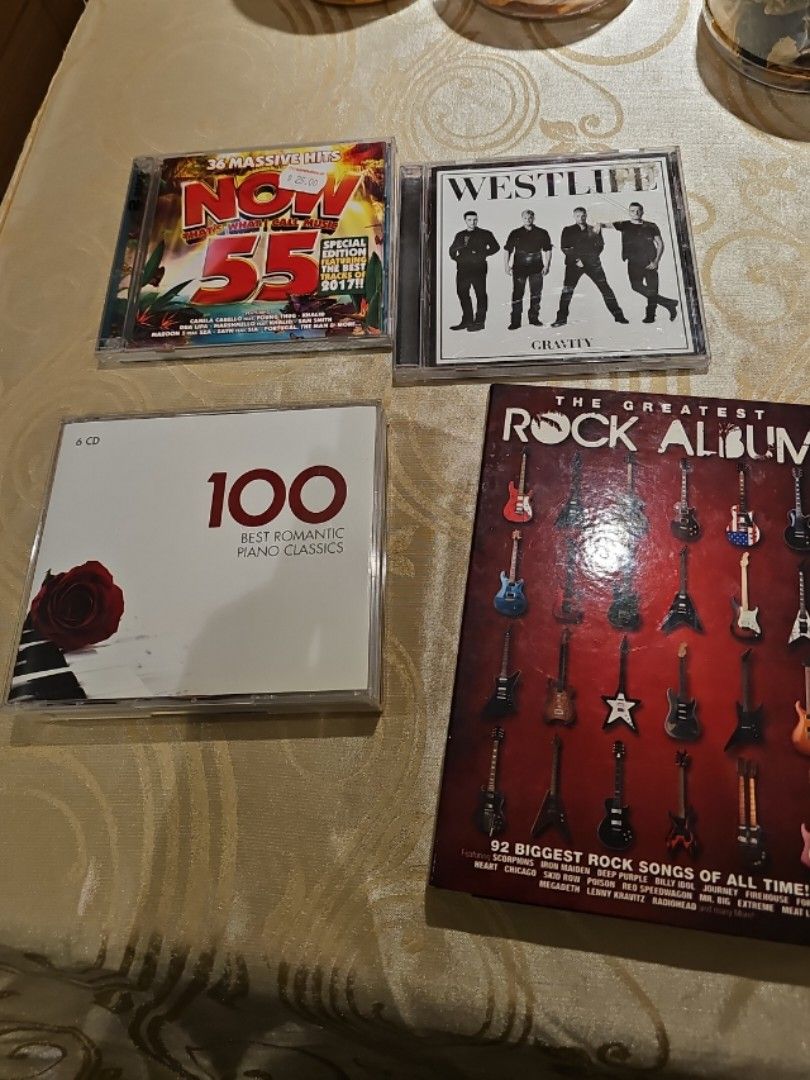 Assorted CDs (Category: CDs & DVDs) located in Singapore. Submitted by alexvause (Listing ID 1348974766, Image 1). Description: Westlife -$5 The greatest rock album - 6 CDs $10 100 Best Romantic Piano Classics - 6 CDs $5 36 Hits $2.