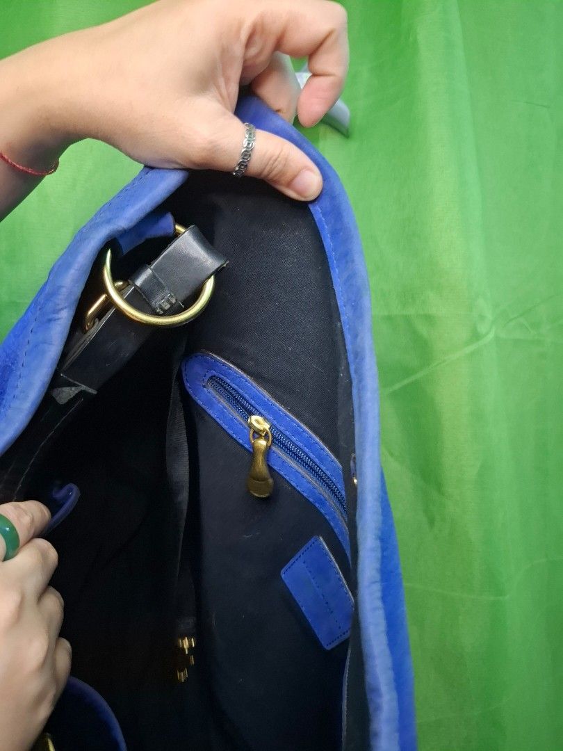 Genuine Leather Hobo Bag -PRELOVED Rabeanco (Category: Shoulder Bags) located in Bulacan. Submitted by juliebeh (Listing ID 1348976630, Image 3). Description: Item- Hobo Bag On tag- Rabeanco Size approx-HxLxBase(inches)-14x17x7 Strap- removable: no, adjustable: no Color- black, blue Material- genuine leather Hardware- brass Inner Lining- black fabric Main Closure- magnetic snap Main Compartment- 1 pockets inside- 2 open, 1 zip Outer Compartment/P