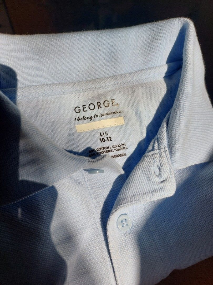 GEORGE Kids Polo Shirt Large (Category: Babies & Kids Fashion) located in Pasig City. Submitted by ielsc (Listing ID 1348896796, Image 2). Description: Brand: George Color: Light/Sky Blue Size: Large (10-12) Condition: Lightly Used.