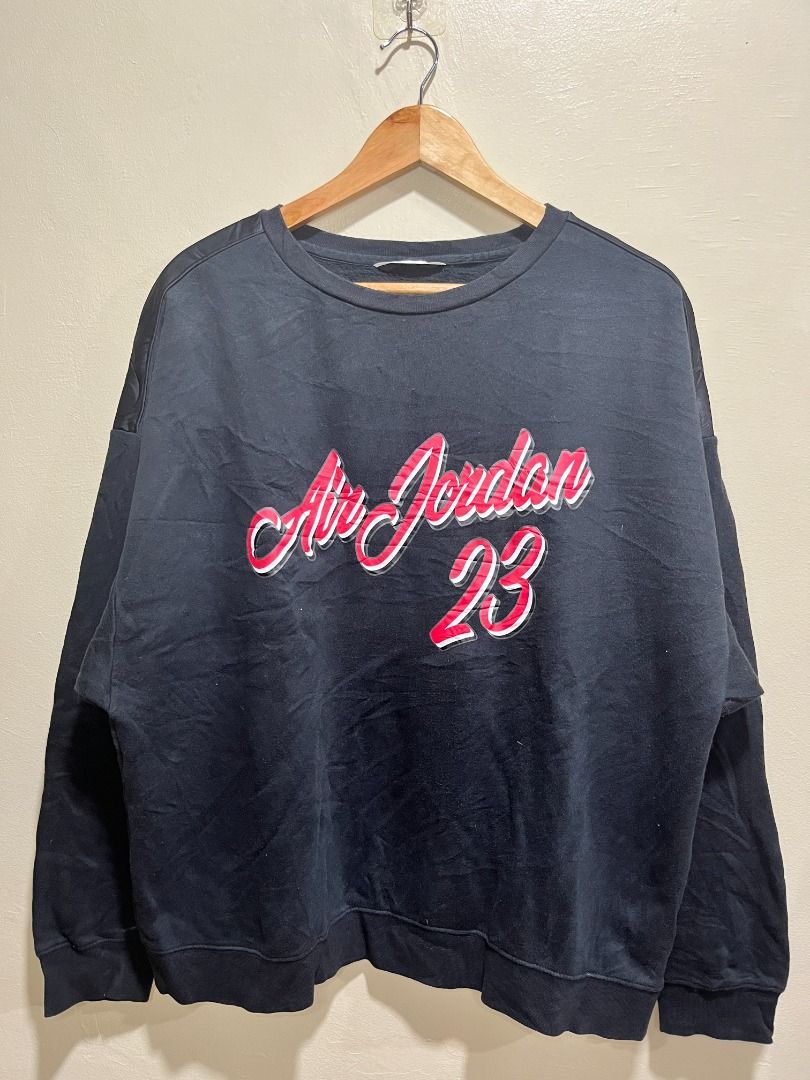 JORDAN 'Air Jordan 23' Sweater (Category: Tshirts & Polo Shirts ) located in Mandaluyong City. Submitted by lcfl1014 (Listing ID 1348931961, Image 1). Description: JORDAN 'Air Jordan 23' Sweater - may faux leather sa shoulder Tela: Heavy Cotton Size: XL on tag. 25inches width, 27inches length Color: Black. 9.5/10 Condition: 9.5/10. lukot lang print, no issues Location: Mandaluyong Delivery: Sho.p.e, Lalamove, J&T.