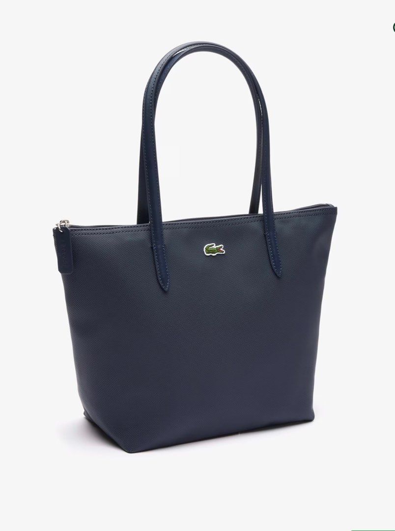 Lacoste small concept tote bag in navy blue (Category: Tote Bags) located in Manila. Submitted by hanamore_ (Listing ID 1348865652, Image 2). Description: 🚨ON SALE TODAY🚨 Lacoste small concept tote bag in navy blue! 💙 ₱5200 only 📌price will change tomorrow ✈️ air cargo 💌pm us for other colors #hanamore.