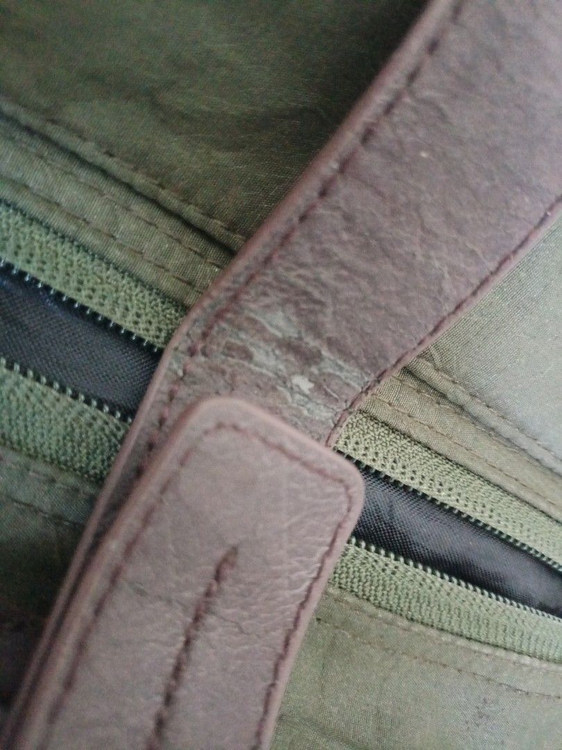 Ladies Bag (Category: Backpacks) located in Paranaque City. Submitted by 27rcd (Listing ID 1348865213, Image 2). Description: Decluttering personal used Fatigue color 14"hx16"L Issue : strap see pic and needs cleaning..