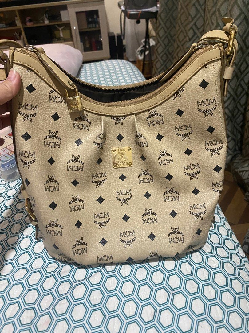 mcm sling bag (Category: Luxury Bags & Wallets) located in Antipolo. Submitted by prelovedcloseta (Listing ID 1348925299, Image 1). Description: auth mcm sling bag preloved with issues as posted with lock n key cant see any tag but ita guaranteed auth ( bought it from legit online seller) rfs: too many bags need to declutter.