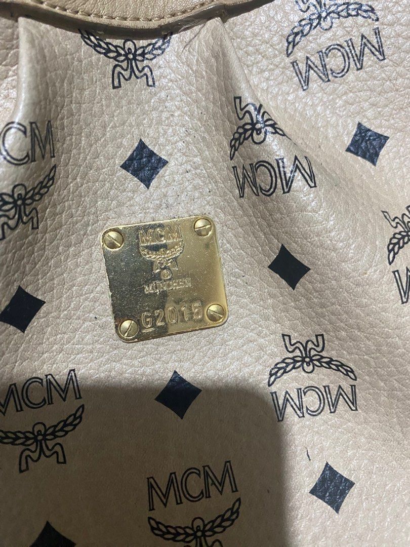 mcm sling bag (Category: Luxury Bags & Wallets) located in Antipolo. Submitted by prelovedcloseta (Listing ID 1348925299, Image 2). Description: auth mcm sling bag preloved with issues as posted with lock n key cant see any tag but ita guaranteed auth ( bought it from legit online seller) rfs: too many bags need to declutter.