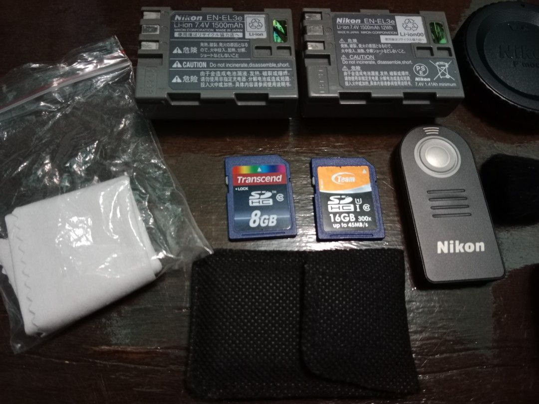 Nikon D90 with accessories (Category: Cameras) located in Makati City. Submitted by aceofspades09 (Listing ID 1348933166, Image 2). Description: NIKON D90 lens kit and accessories - Nikon Lens 105mm w/ protective lens - 2 Nikon batteries - 1 Camera bag (Benro) - 1 Nikon Remote Control - 1 battery charger - 3 lens caps - 1 Yongnuo SpeedLite (YN565EX) - 1 Flash Defuser - 1 Yongnuo Flash Trigger (RF603N II) - 1 Side Grip Free: - 1 dusting brush - 2 