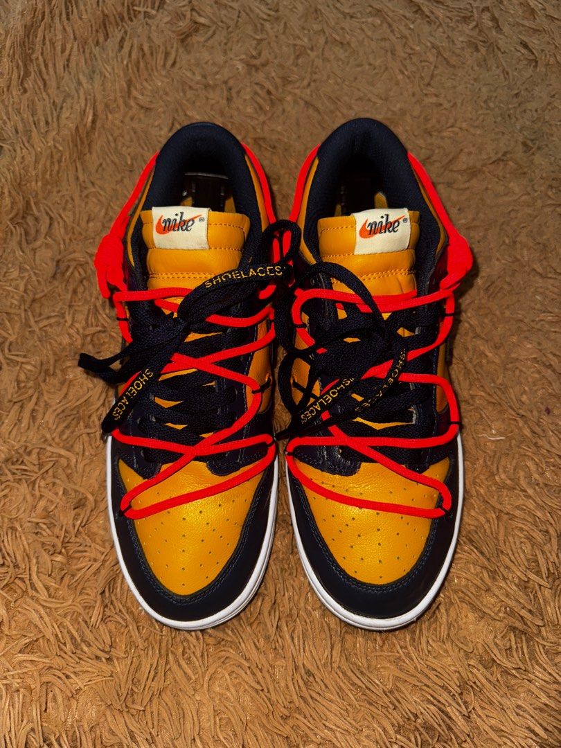 Off-White Nike dilunk low university gold (Category: Sneakers) located in Manila. Submitted by all_day_thrift (Listing ID 1348832688, Image 1). Description: Off-white nike dunk low university gold *Color may vary due to lighting Con.8/10 Issue: Hell drag/see pictures Size:9 US.