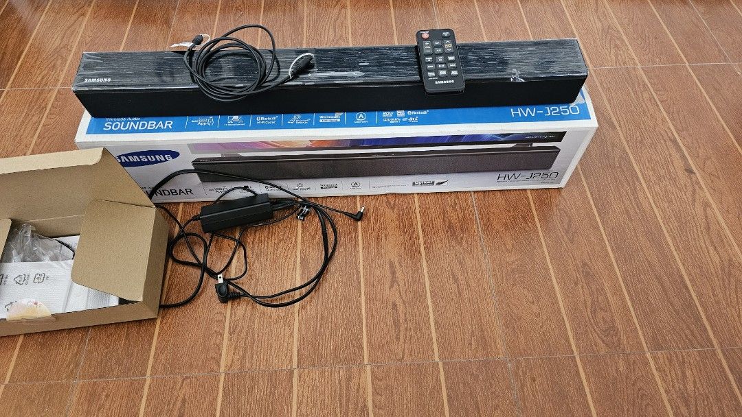 Samsung Soundbar HW-J250 (Category: Soundbars, Speakers & Amplifiers) located in Las Pinas. Submitted by fohngee (Listing ID 1348887502, Image 2). Description: Samsung Soundbar HW-J250 complete package Includes: - Box - Manual/Paperwork - Power adapter - Optical cable - Remote control - USB dongle adapter - Wall mount kit (unused) Top sticker still intact. No visible dents or scratches. Purchased in early 2019 with receipt ~6k new. Connectivity: 