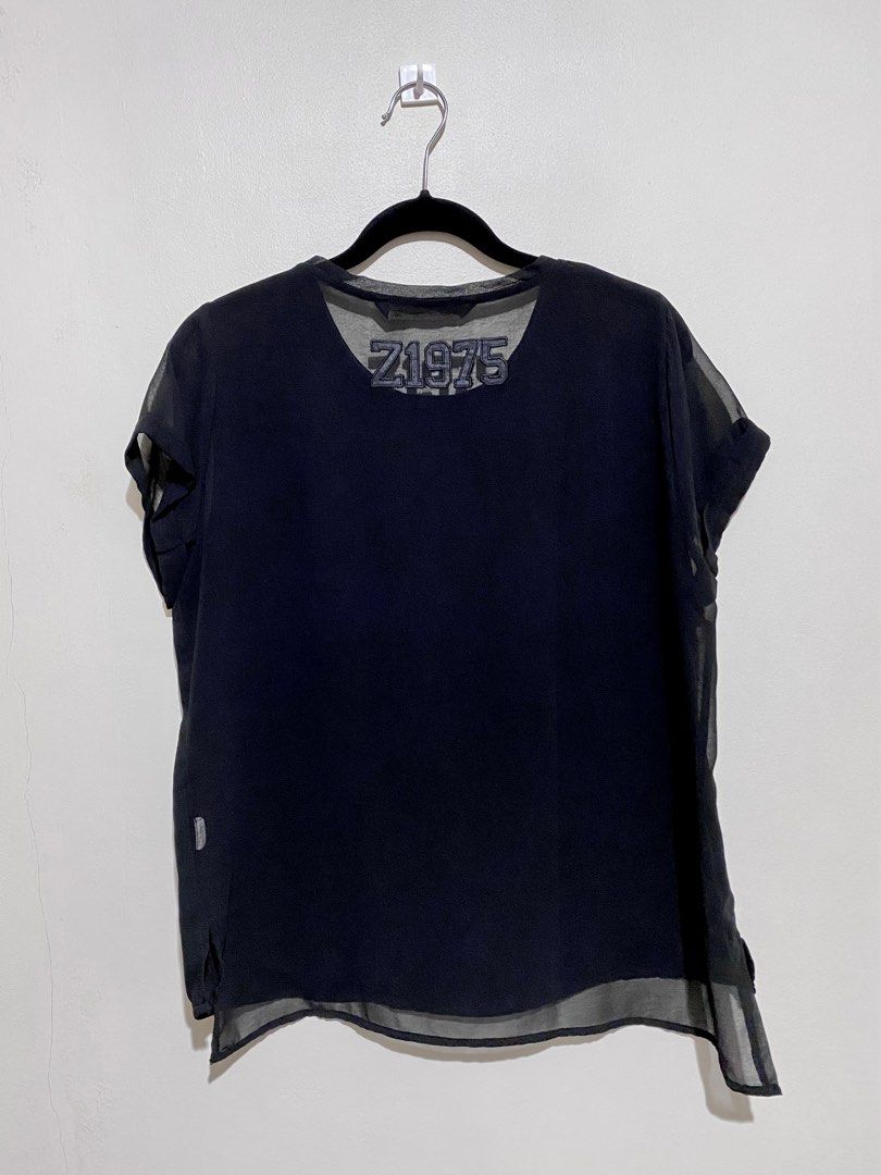 Zara Basic Chiffon Z1975 See Through Back Black T-shirt Top (Category: Shirts) located in Manila. Submitted by simoonie (Listing ID 1348854611, Image 2). Description: In great condition! 👍 Only worn once or twice. Store bought. Zara black chiffon tee shirt: Z1975 back satin embroidery, see through sleeves and back, flowy material, side slits, longer back. ✨ — Measurements Approx (lay flat) — - Size on tag: US Medium - Chest (armpit to armpit): 2