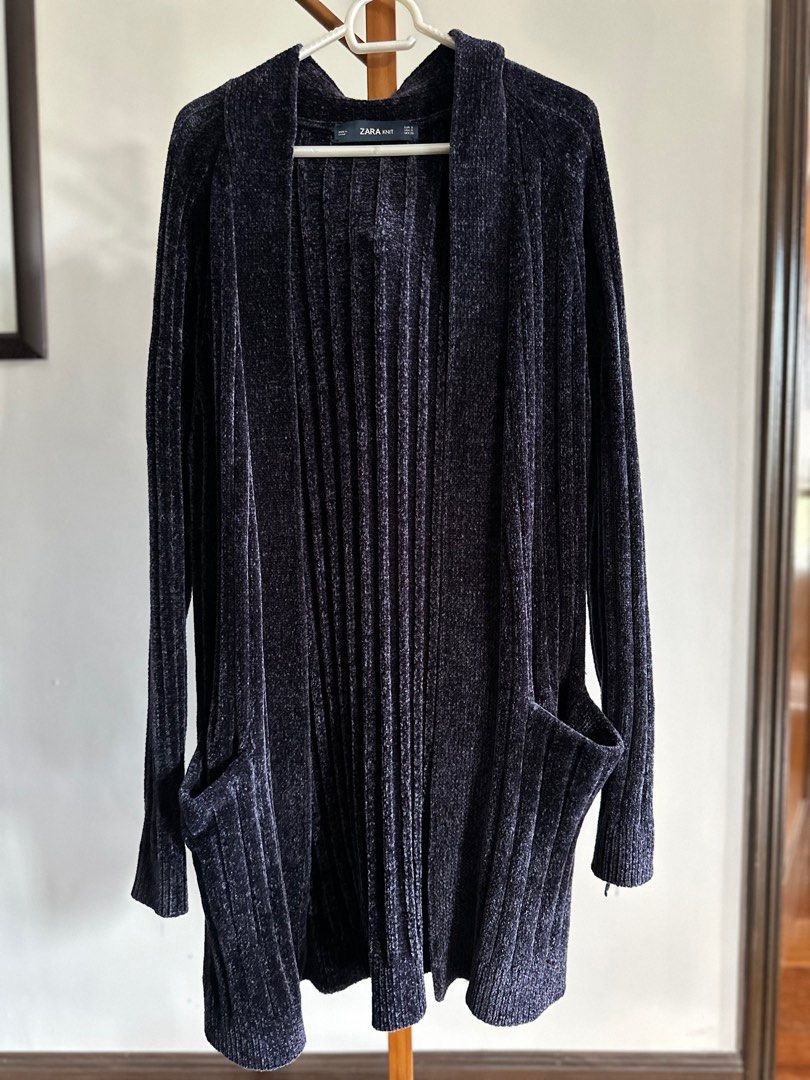 Zara Knit Cardigan (Category: Coats, Jackets and Outerwear) located in Marikina City. Submitted by samndbx (Listing ID 1348870590, Image 1). Description: Above the knee length Color: deep / dark violet (almost black) Knit - chunky, very warm and cozy Size small but can fit medium.