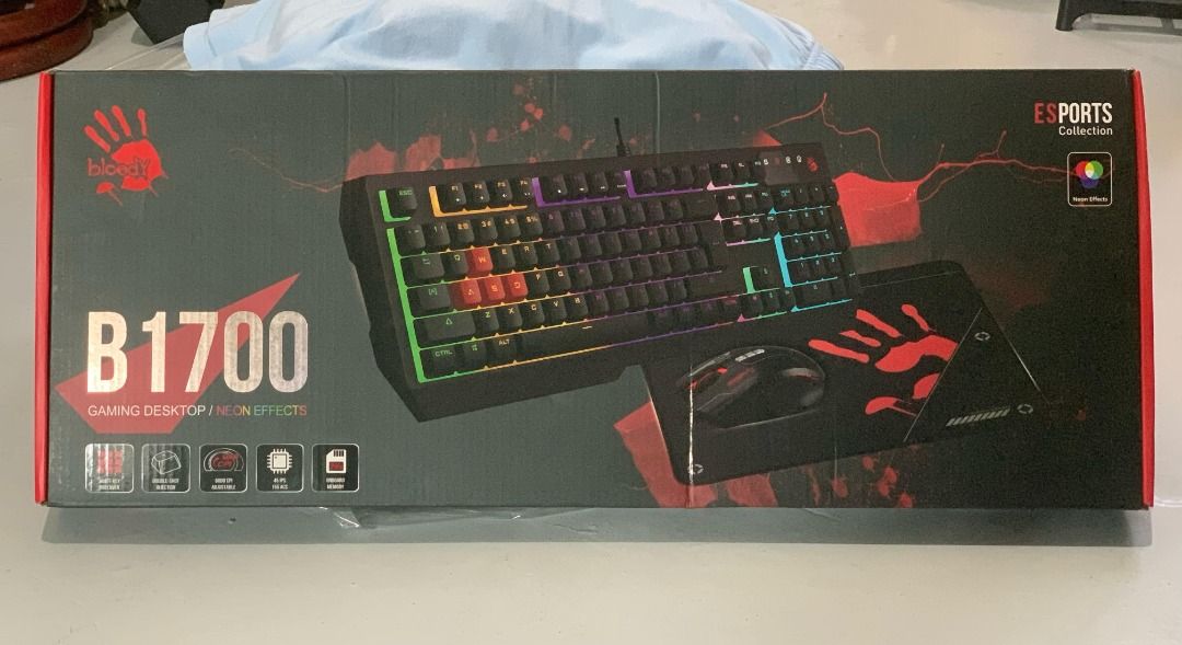 A4Tech Bloody B1700 Neon Effects Gaming Keyboard, Mouse, Mousepad combo (Category: Computer Keyboard) located in Pasig City. Submitted by bechay2 (Listing ID 1349027737, Image 1). Description: A4Tech Bloody B1700 Neon Effects Gaming Keyboard, Mouse, Mousepad combo - P1,600 - Authentic A4tech Bloody - Brand New/Unopened Package Contents - Gaming Keyboard - Gaming Mouse - Mouse pad - Keycap Puller - 4 extra keycaps .
