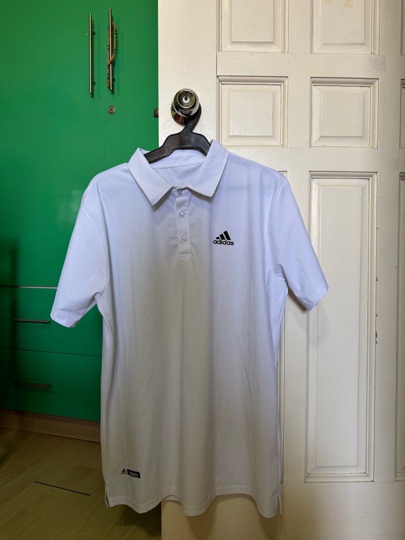 Adidas Training Polo Shirt (Dri-Fit) (Category: Tshirts & Polo Shirts ) located in Dagupan City. Submitted by kassiedee (Listing ID 1349030448, Image 1). Description: Not Orig! Bought in Palladium Night Market, Thailand Color: White Size: XL (but can fit L) Dri-fit Condition: 10/10 RFS: decluttering/wrong size.